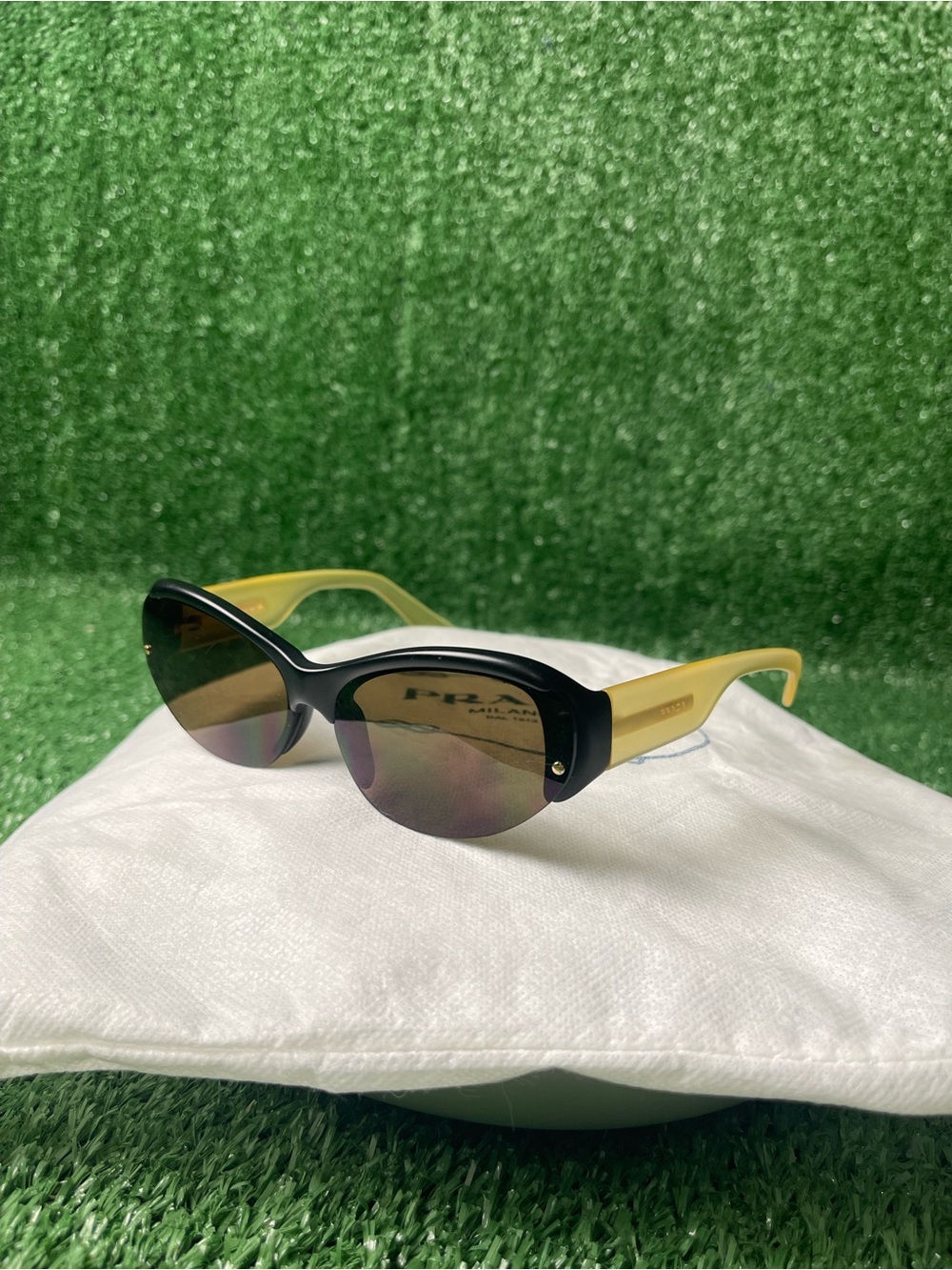 Prada Two-Tone Cat Eye Sunglasses in Black and Yellow